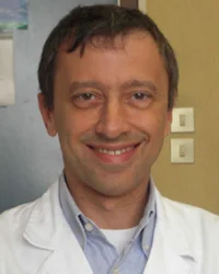Dr. Enzo Massimo Caruso